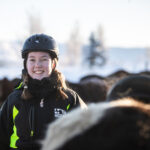 Happy girl riding the Icelandic Horse